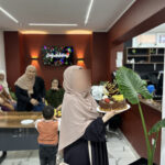 Elite d'Or English teacher Roumaissa commemorative photo during her birthday celebration party at the academy