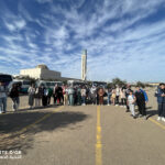 Elite d'Or group photo during the International Book Fair trip with the Great Mosque of Algiers in the background (4)