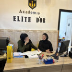 Elite d'Or reception team at Branch 1 smiling together at the front desk Dellys Algeria