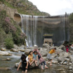 Elite-dOr-students-and-their-families-enjoying-the-waterfall-scenery-during-the-Kfrida-nature-trip