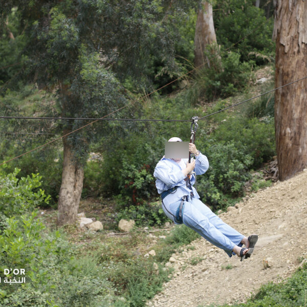 Elite-dOr-students-having-fun-on-the-tyrolean-zip-line-during-the-Kfrida-adventure-trip-Algeria
