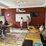 Elite d'Or teen English language class student participating at the whiteboard during a lesson Dellys Algeria