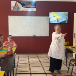 Elite d'Or teen French language class teacher explaining the lesson and smiling Dellys Algeria