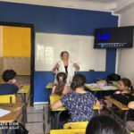 Elite d'Or teen French language class with teacher and students inside the classroom Dellys Algeria