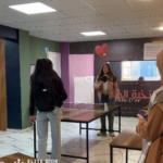 Elite d'Or two students playing ping pong inside the academy recreational area (2)
