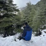 Nadjib from Elite d'Or management team back view photo during the Tikjda winter mountain trip Algeria