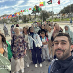 Nadjib from Elite d'Or selfie with students and parents during the International Book Fair trip Algiers Algeria